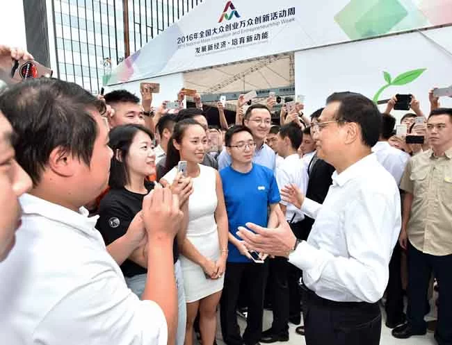 李克强双创周上为创业者“发红包”(图5) 李克强双创周上为创业者“发红包”(图5)